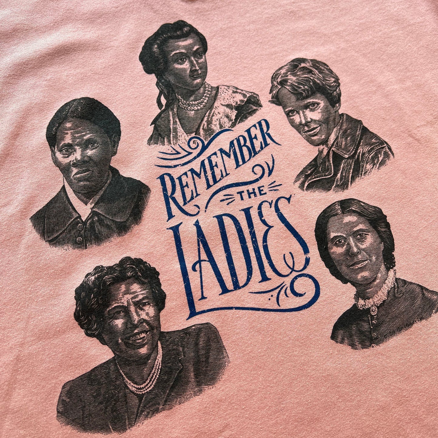 Close-up of "Remember the Ladies" Women's v-neck shirt — Circular design from The History List store in Pink