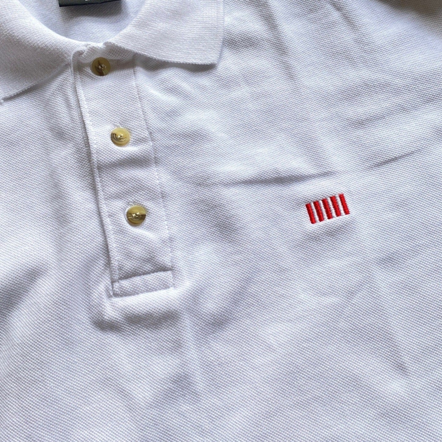 Close-up White "Sons of Liberty" 1776 Polo shirt— From the History List Store 