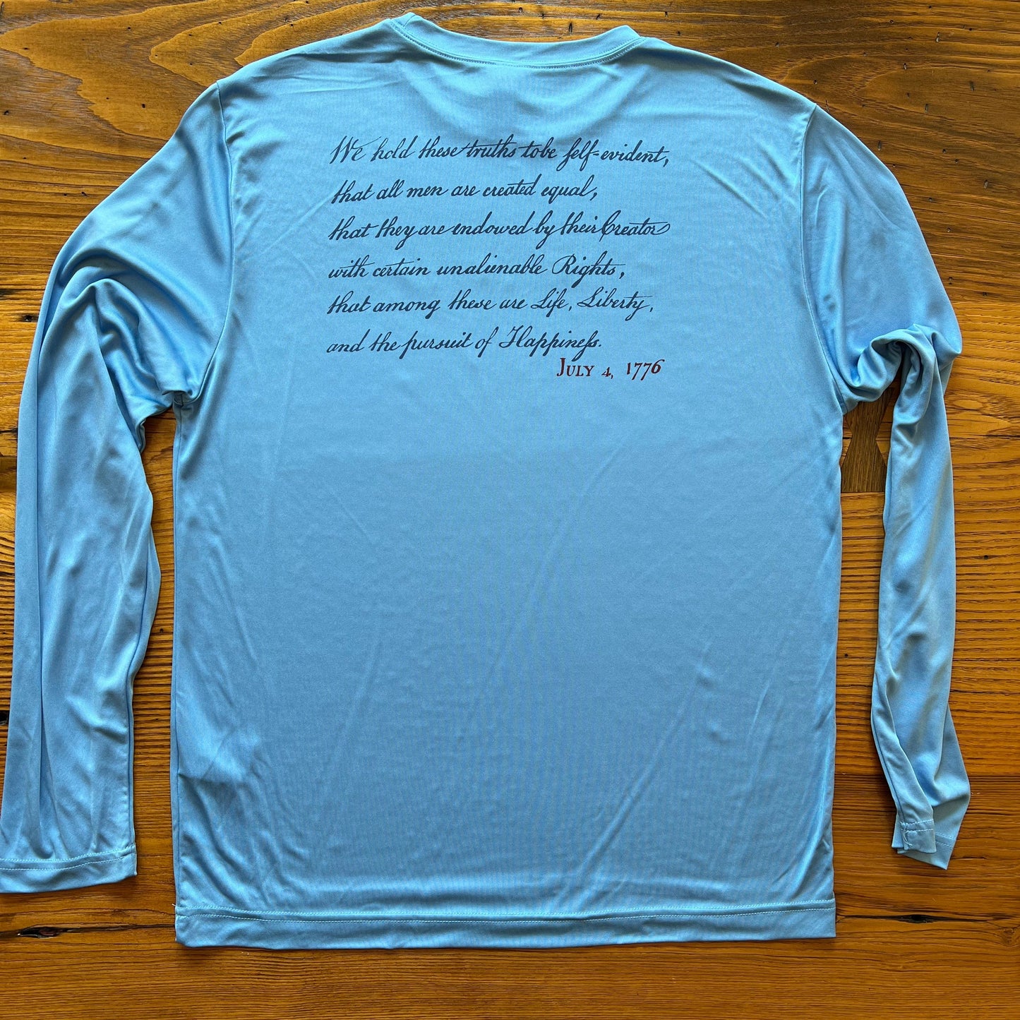 Back of "We hold these truths - July 4, 1776” on moisture-wicking 100% polyester interlock with SPF 40+ UV protection - Long-sleeved from The History List store